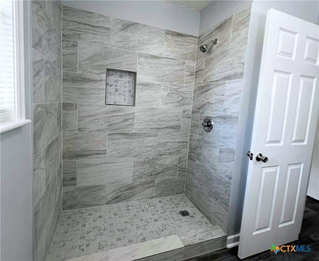 1818 Travis Ave, Victoria, TX 77901 - bathroom featuring a tile shower