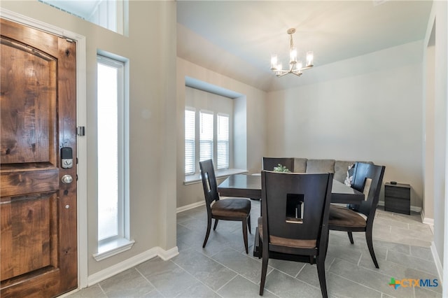 dining room with a notable chandelier