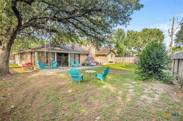 119 Larimore St, Victoria, TX 77904 - view of yard with a patio area