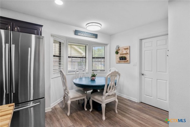 119 Larimore St, Victoria, TX 77904 - dining area featuring baseboards and wood finished floors