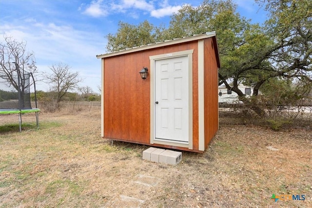 view of outbuilding featuring a trampoline