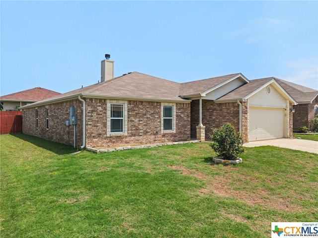 ranch-style house featuring a front lawn and a garage