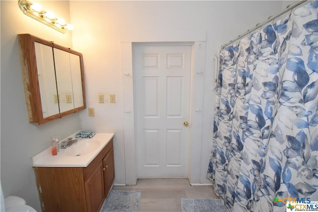 920 S 33rd St, Temple, TX 76504 - bathroom featuring vanity and walk in shower