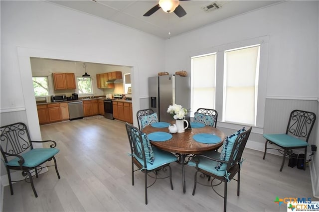 920 S 33rd St, Temple, TX 76504 - dining space featuring ceiling fan and light hardwood / wood-style floors