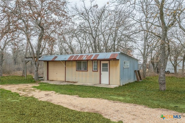 13230 Harvest Hill Ln, Holland, TX 76534 - view of outbuilding featuring a yard and a garage