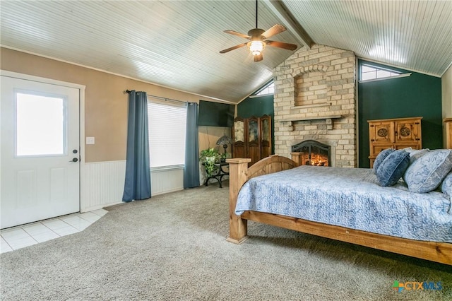13230 Harvest Hill Ln, Holland, TX 76534 - bedroom with a fireplace, light colored carpet, lofted ceiling with beams, and ceiling fan