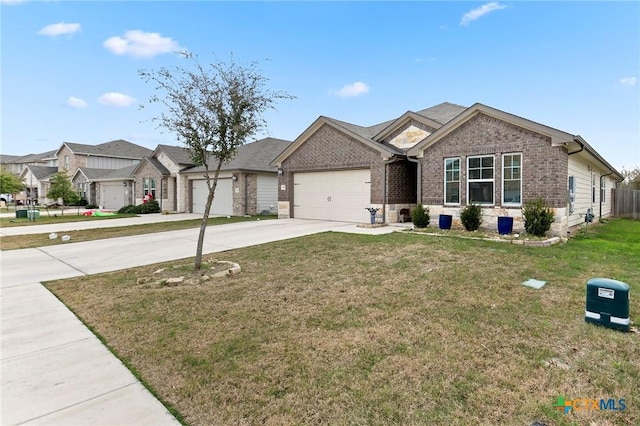 view of front of property featuring a garage and a front yard