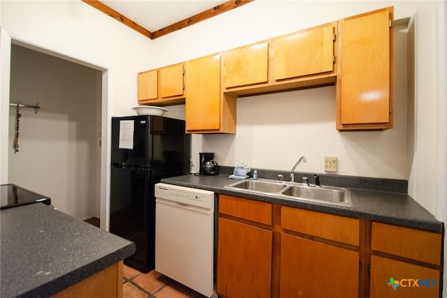 kitchen with light tile patterned flooring, sink, black fridge, crown molding, and white dishwasher