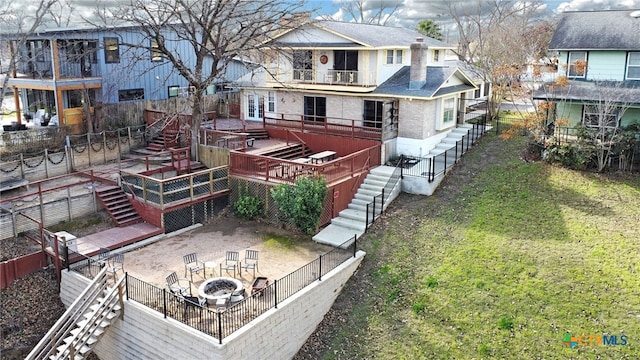 exterior space with a fire pit