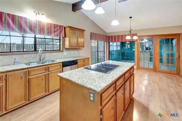 kitchen featuring dishwasher, sink, light hardwood / wood-style floors, black electric cooktop, and a kitchen island