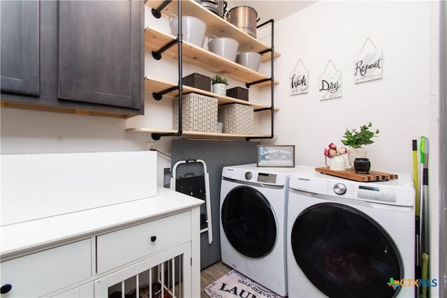 3810 Twilight Dr, Temple, TX 76502 - laundry room featuring cabinet space, washer and dryer, and light wood-type flooring