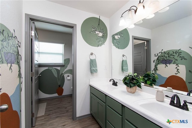 3810 Twilight Dr, Temple, TX 76502 - full bathroom featuring wood finished floors and double vanity