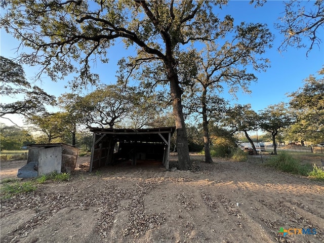 exterior space featuring an outbuilding