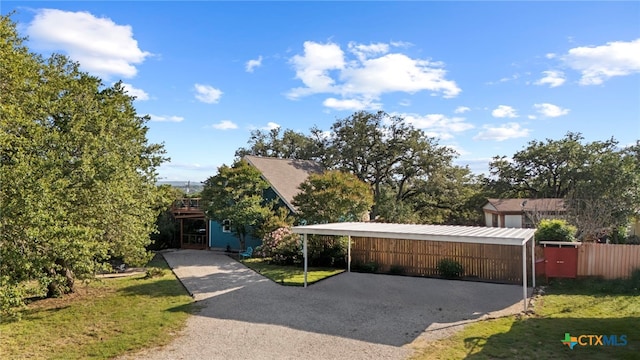 1400 Willow Dr, Canyon Lake, TX 78133 - view of front of home featuring driveway and a carport