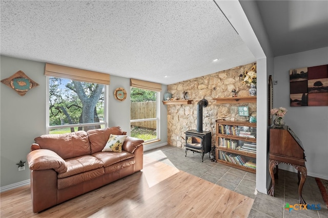 1400 Willow Dr, Canyon Lake, TX 78133 - living area with a wood stove and a textured ceiling