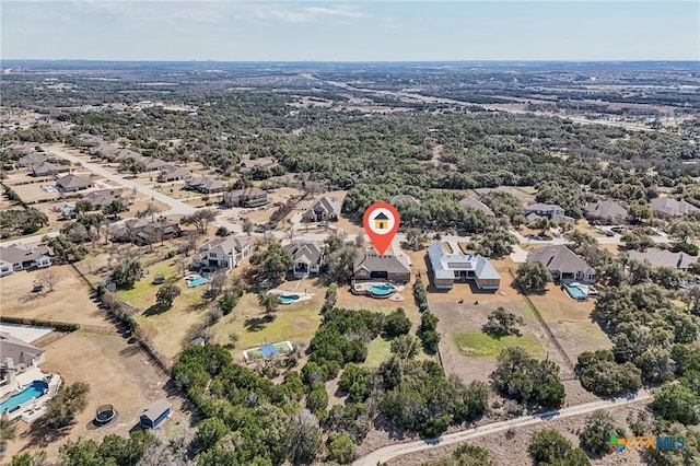 birds eye view of property with a residential view