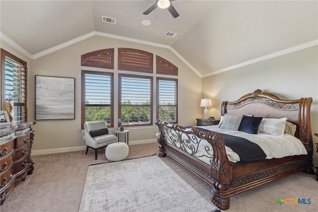 bedroom with carpet, visible vents, crown molding, and lofted ceiling