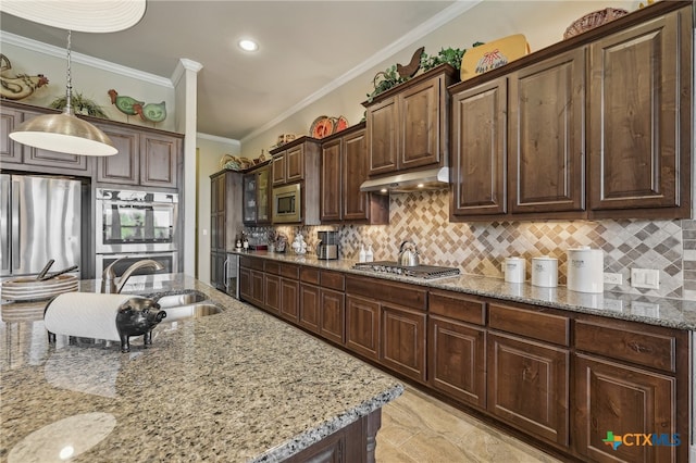 kitchen featuring appliances with stainless steel finishes, crown molding, under cabinet range hood, and tasteful backsplash