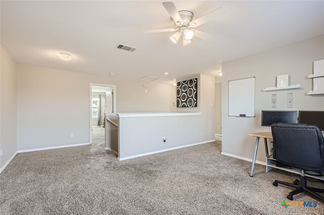 office with ceiling fan and carpet flooring