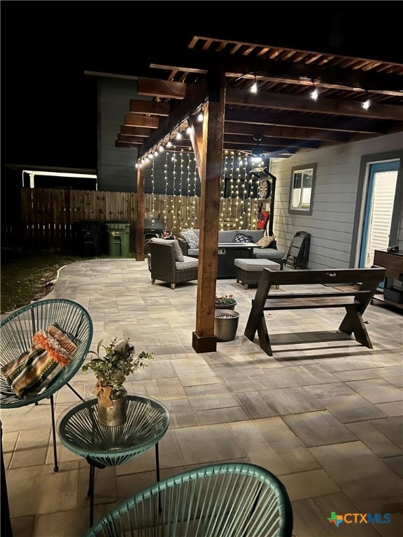 view of patio featuring an outdoor living space and a pergola