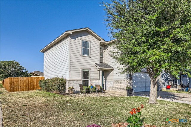 view of property with a front lawn