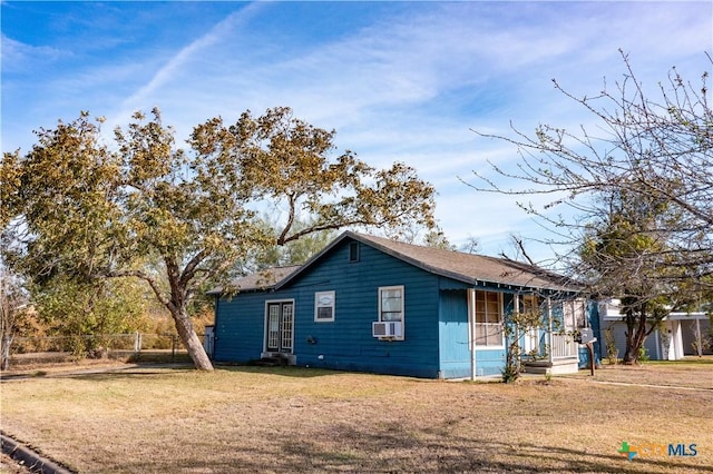 702 E Anaqua Ave, Victoria, TX 77901 - view of property exterior with cooling unit and covered porch