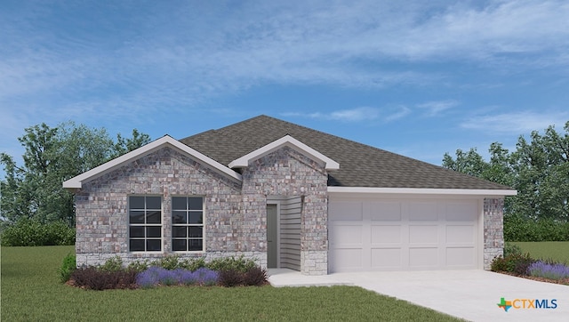 view of front of property with a garage and a front lawn