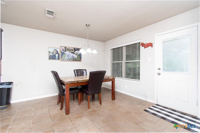 602 Dusty Trl, Belton, TX 76513 - dining area featuring a chandelier and baseboards