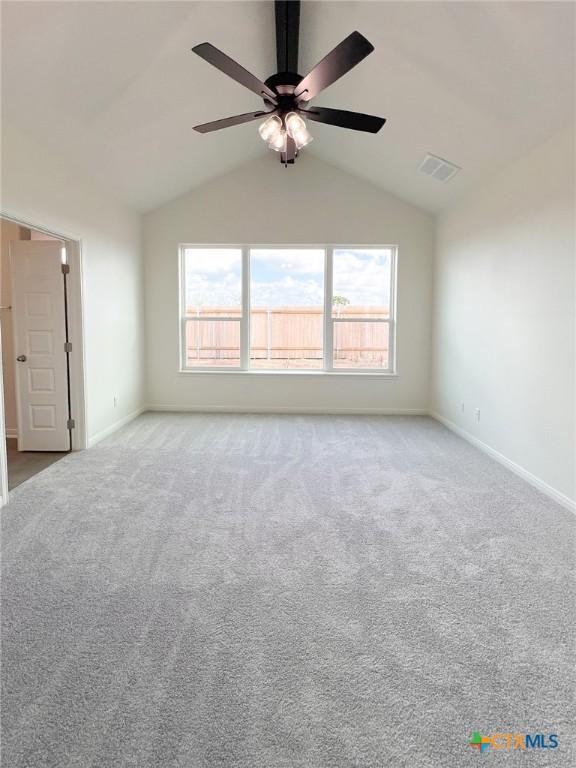 116 Raindance Ct, Victoria, TX 77904 - carpeted spare room featuring lofted ceiling and a ceiling fan