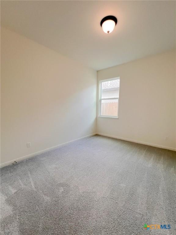116 Raindance Ct, Victoria, TX 77904 - carpeted spare room with baseboards