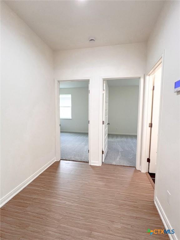 116 Raindance Ct, Victoria, TX 77904 - hallway with wood finished floors