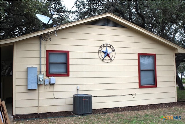 view of home's exterior featuring central air condition unit