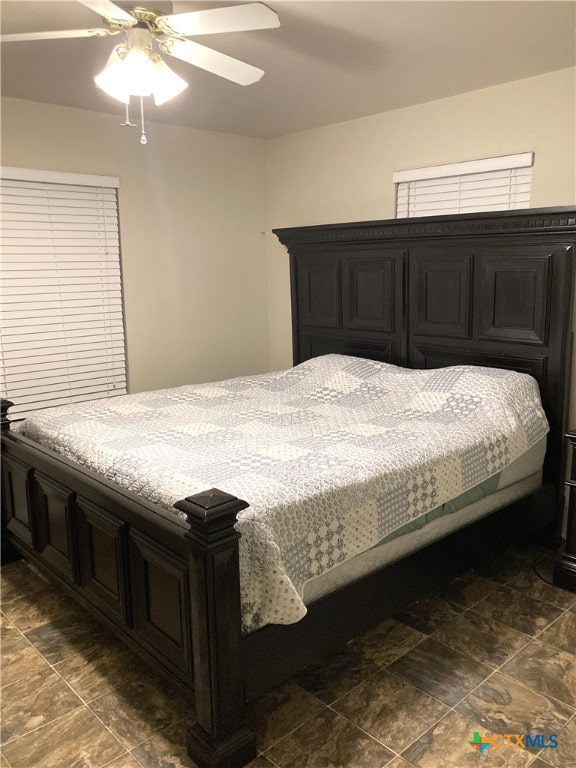 bedroom featuring ceiling fan