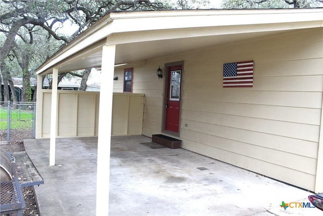 view of patio / terrace featuring a carport