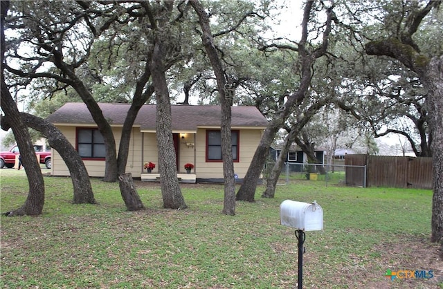 view of front of home with a front yard