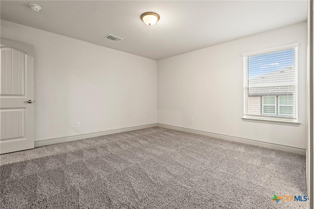 view of carpeted spare room