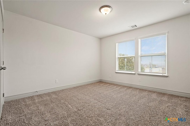 empty room with carpet floors