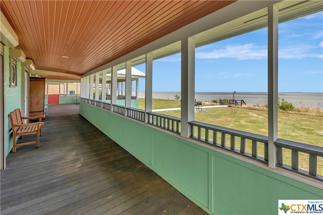 403 Bay St, Austwell, TX 77950 - unfurnished sunroom with a water view and wood ceiling
