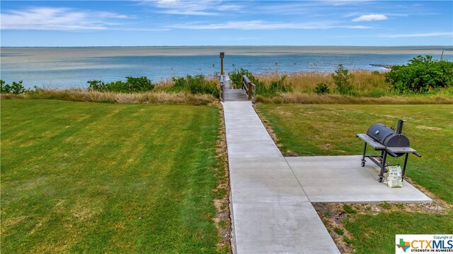 403 Bay St, Austwell, TX 77950 - view of home's community with a water view and a yard