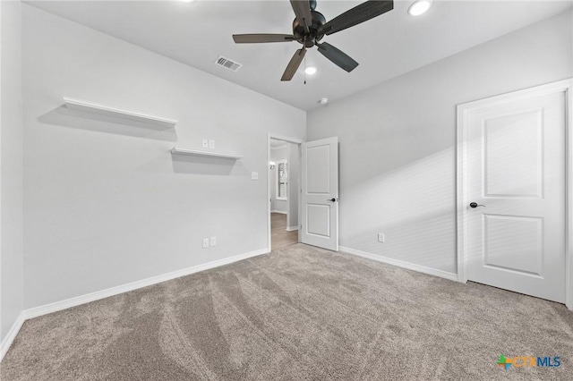 unfurnished bedroom featuring carpet flooring and ceiling fan