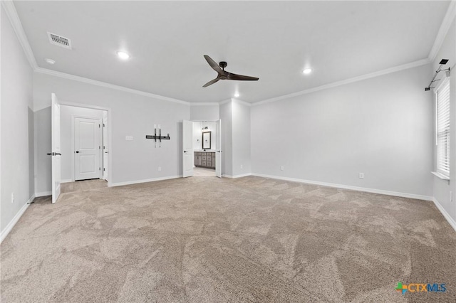 unfurnished living room with ceiling fan, crown molding, and light carpet