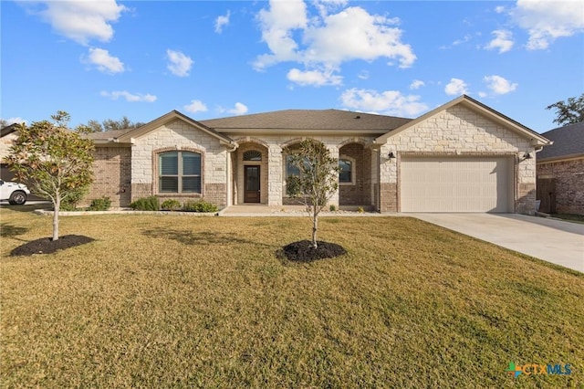 ranch-style home featuring a garage and a front lawn