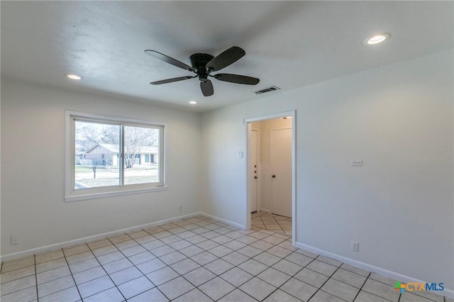 spare room with recessed lighting, visible vents, a ceiling fan, light tile patterned flooring, and baseboards