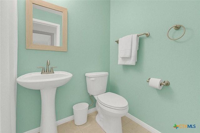 1069 Trail Pass Dr, Canyon Lake, TX 78133 - half bathroom featuring toilet and tile patterned floors