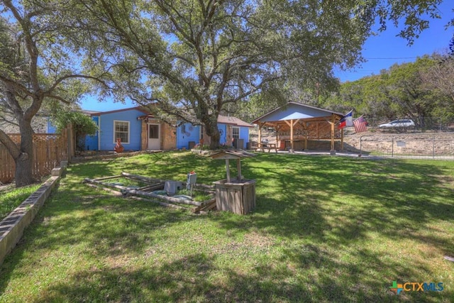 view of yard featuring fence