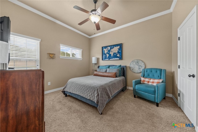 carpeted bedroom with ceiling fan and crown molding