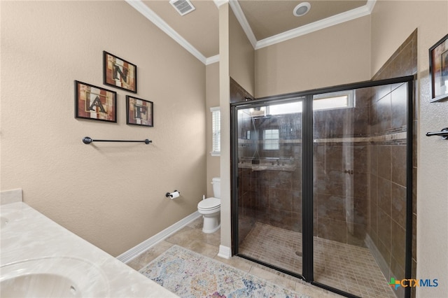 bathroom featuring walk in shower, tile patterned flooring, ornamental molding, vanity, and toilet