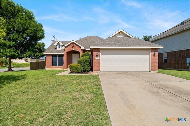 901 Mustang Trl, Harker Heights, TX 76548 - traditional-style house with brick siding, concrete driveway, a garage, and a shingled roof