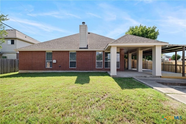 901 Mustang Trl, Harker Heights, TX 76548 - rear view of property with a patio, roof with shingles, a chimney, and brick siding
