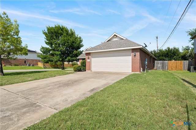 901 Mustang Trl, Harker Heights, TX 76548 - view of front of property with brick siding, driveway, a garage, and a shingled roof